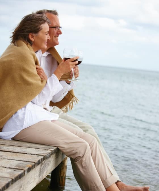 Older Couple Drinking Wine — Financial Advisors in Maroochydore, QLD